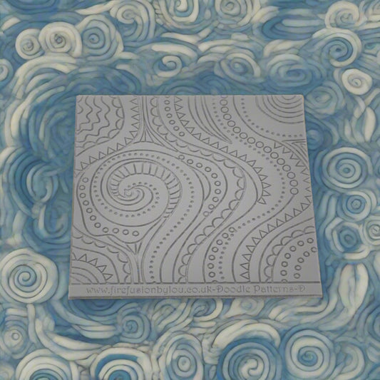 A pattern debossed texture mat in grey material. This texture mat will give you an embossed effect on metal clay or polymer clay.