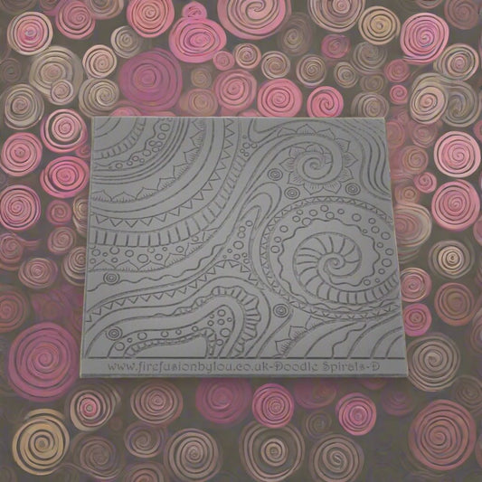 A pattern debossed texture mat in grey material. This texture mat will give you an embossed effect on metal clay or polymer clay.