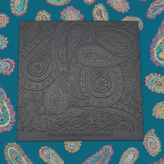 A pattern debossed texture mat in grey material. This texture mat will give you an embossed effect on metal clay or polymer clay.