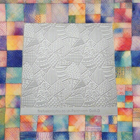 A pattern debossed texture mat in grey material. This texture mat will give you an embossed effect on metal clay or polymer clay.