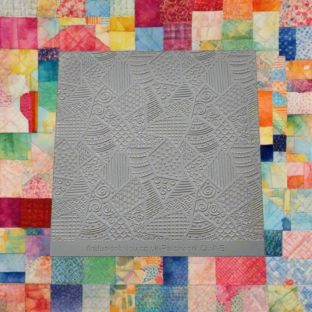 A pattern embossed texture mat in grey material. This texture mat will give you a debossed effect on metal clay or polymer clay.