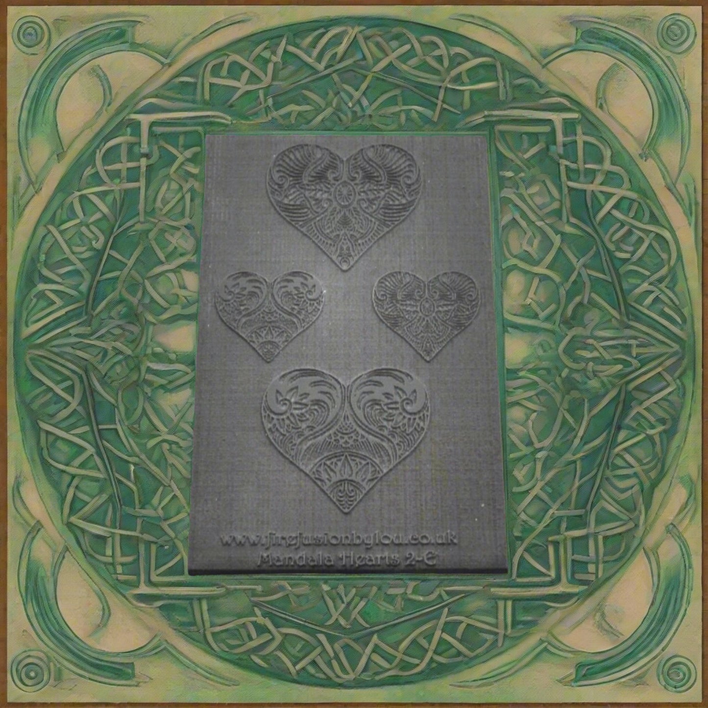 A pattern embossed texture mat in grey material. This texture mat will give you a debossed effect on metal clay or polymer clay.