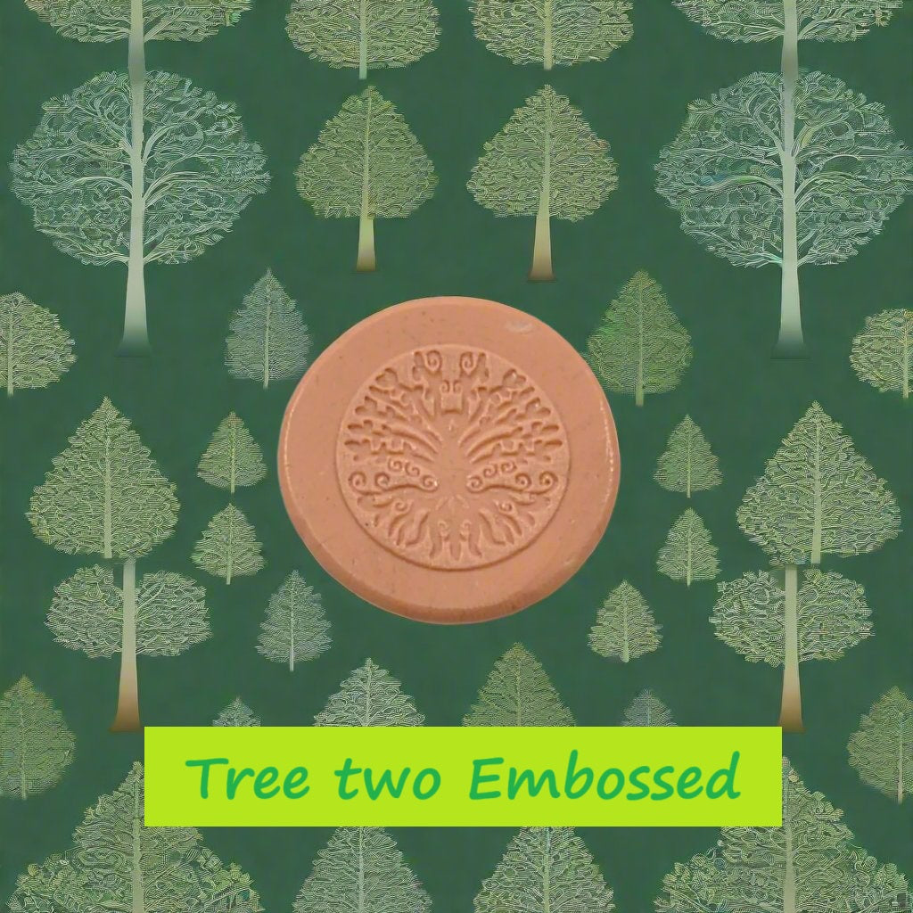 A pattern debossed in silly putty Using a patterned embossed texture mat in grey material. This will give you an idea of what it will look like on metal clay or polymer clay.