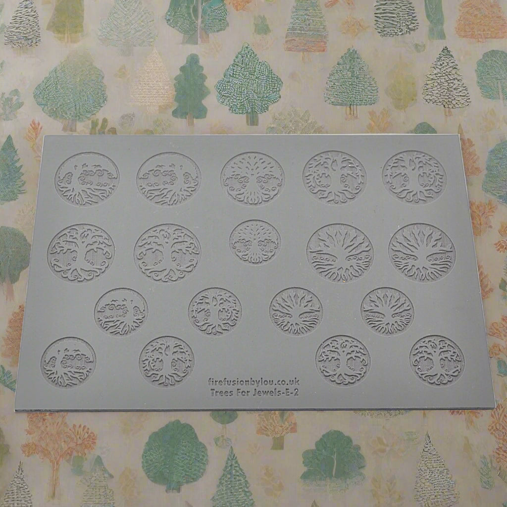 A 145 x 100 millimetre texture mat with five tree designs, two sizes and mirror images, eighteen designs in total.
Use to make an impression on metal clay and polymer clay.