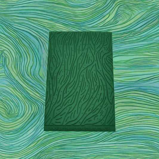 A pattern debossed texture mat. This texture mat will give you an embossed effect on metal clay or polymer clay.