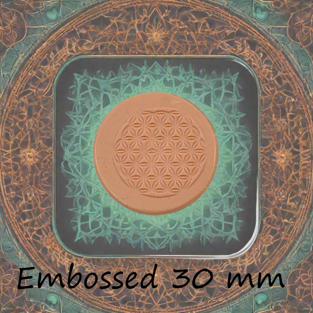 30 mm Flower of Life design debossed in silly putty Using an embossed texture mat. This will give you an idea of what it will look like on metal clay or polymer clay