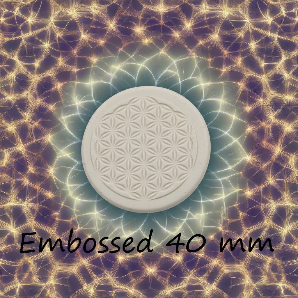 40 mm Flower of Life design debossed in clay Using an embossed texture mat. This will give you an idea of what it will look like on metal clay or polymer clay