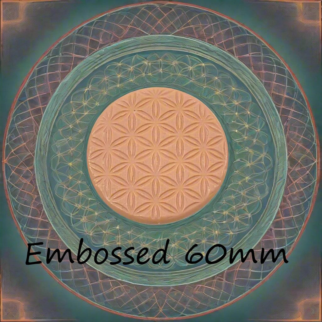 60 mm Flower of Life design debossed in silly putty Using an embossed texture mat. This will give you an idea of what it will look like on metal clay or polymer clay