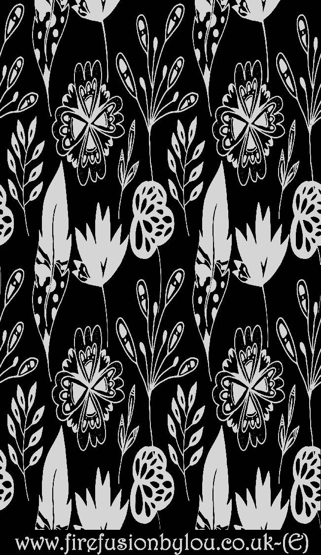 An embossed texture mat of flowers. This picture shows the texture mat pattern in black and white for use on metal clay or polymer clay.
