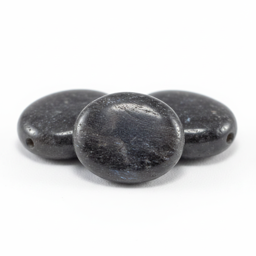 Three dark gray beads on a white background