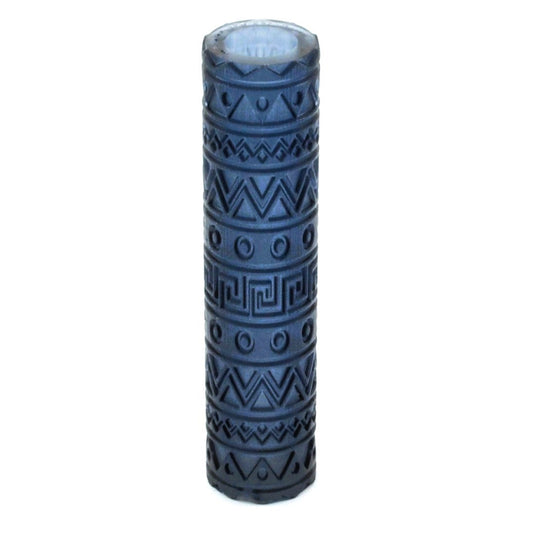 Blue cylindrical object with geometric patterns on a white background