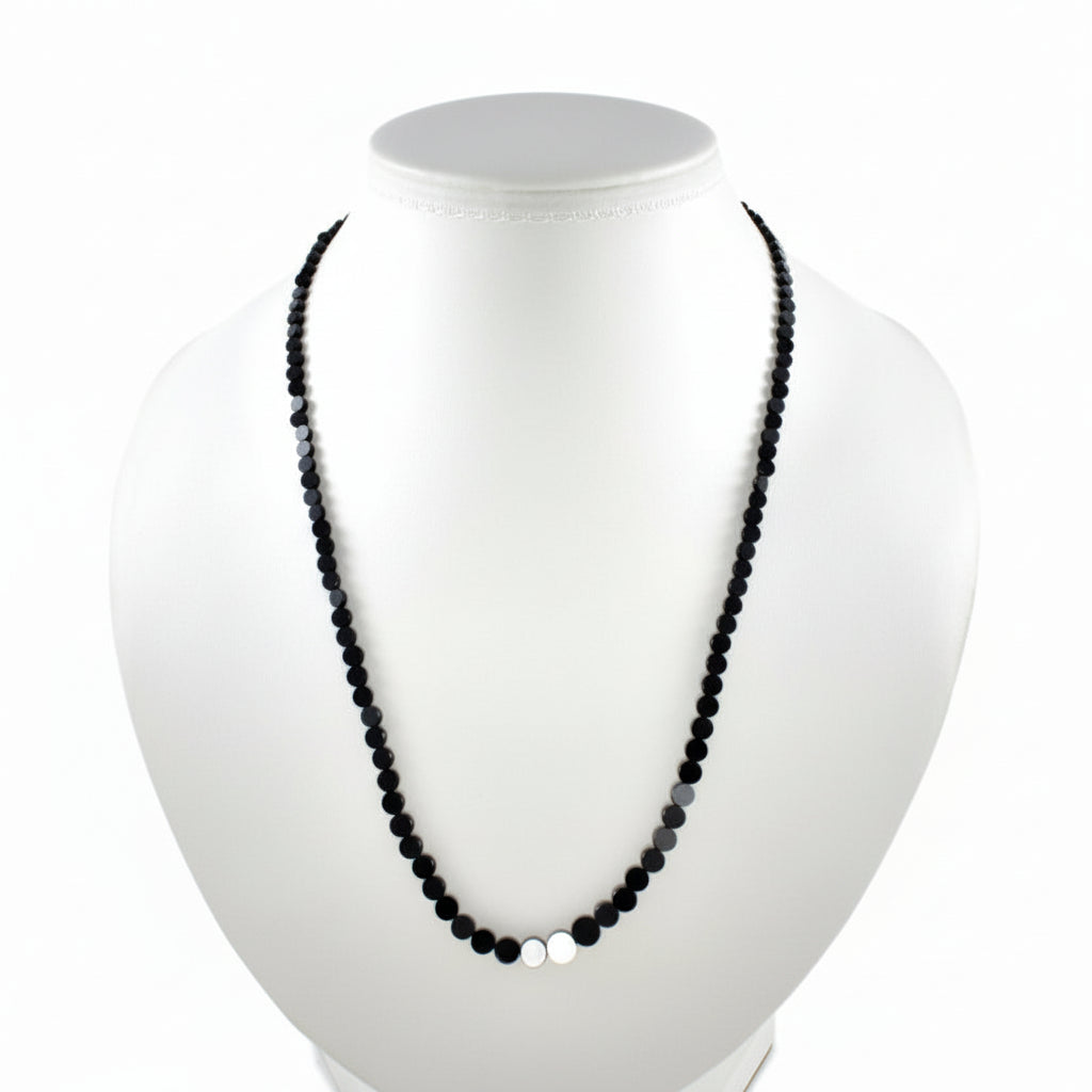These glossy and shiny Black Obsidian graduated coins range from 7 to 4mm and form a 16 inch strand, designed to beautifully reflect light.