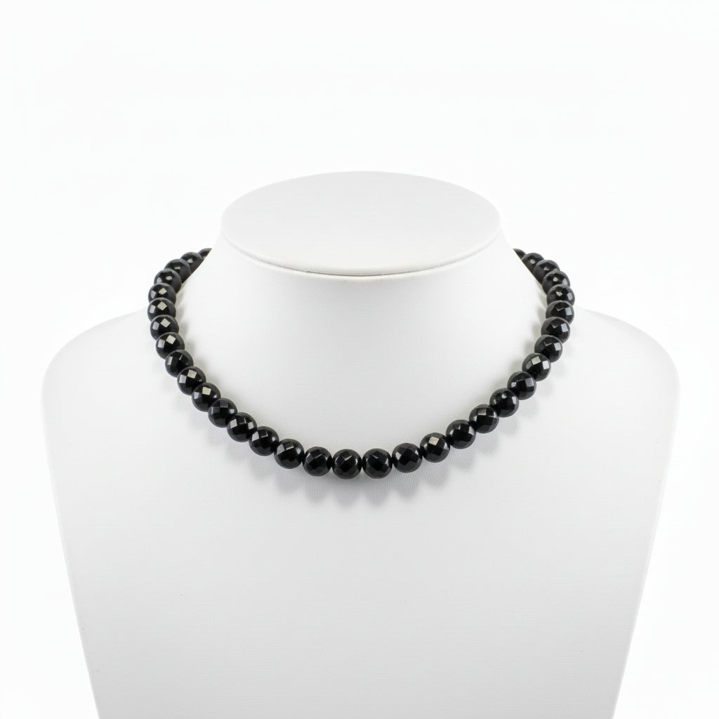 "Black Agate faceted round beads 10mm with sparkling finish on white background"