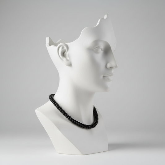"Side view of black agate rondelle beads showing 7mm diameter and 4mm thickness"