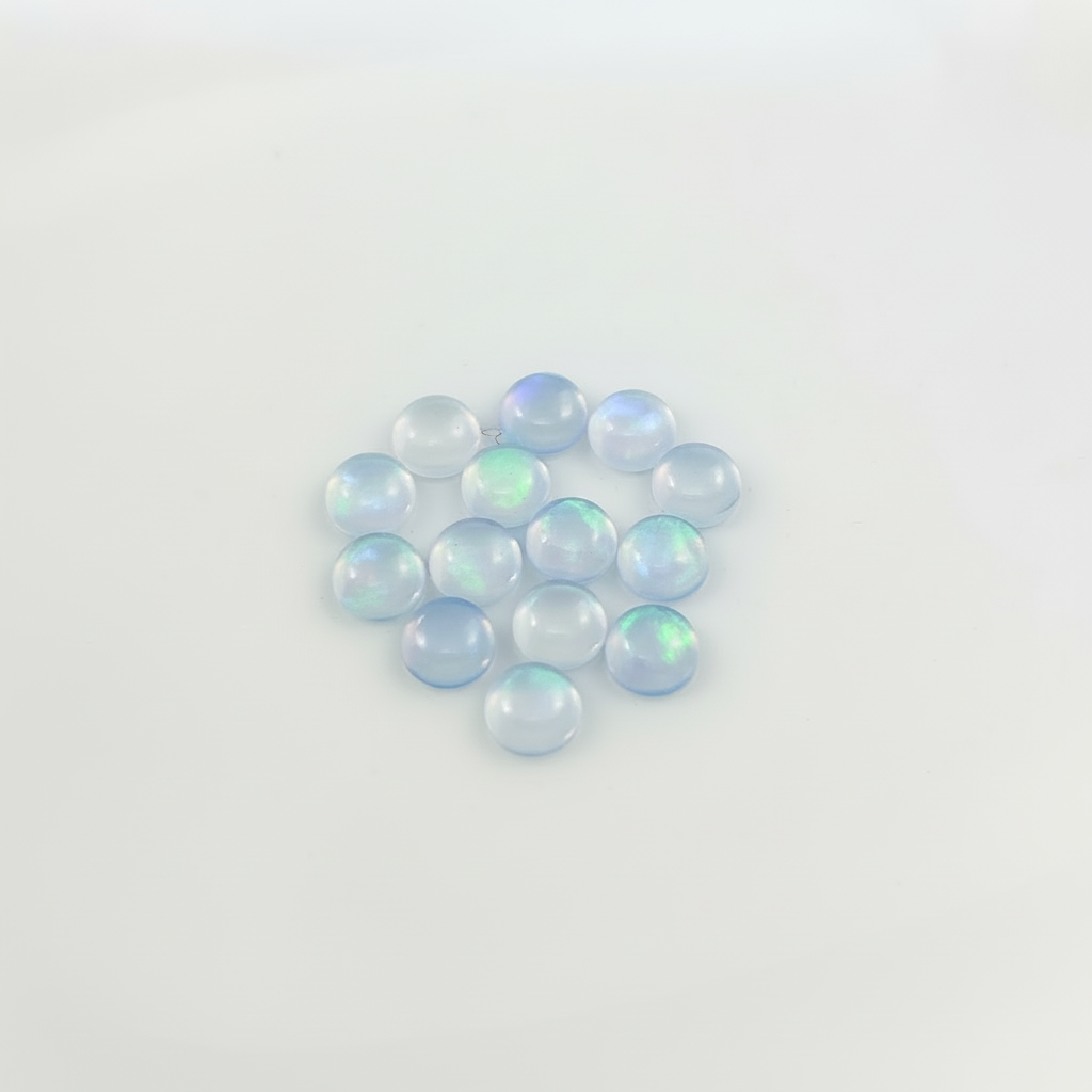 Blue Opal with green fire on a light background