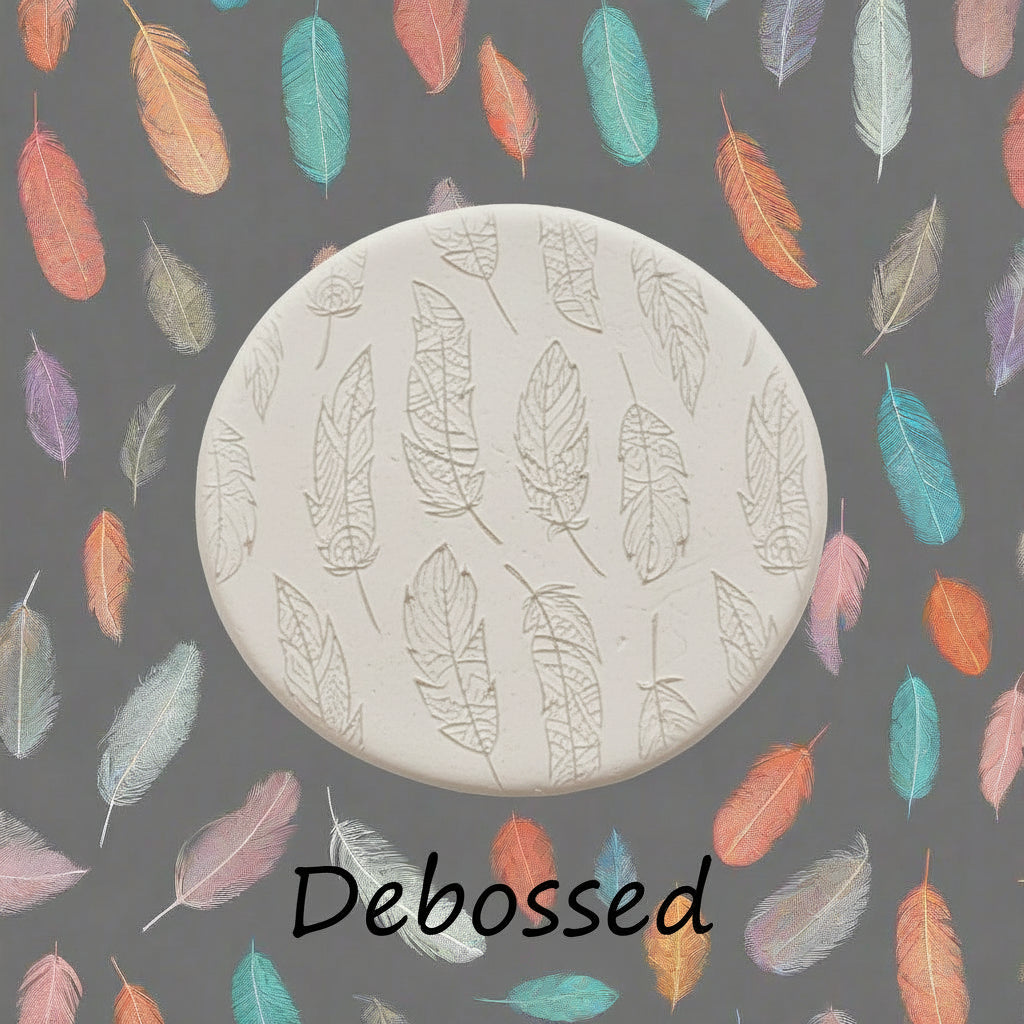 Boho Feathers design embossed in clay using a  debossed texture mat. 