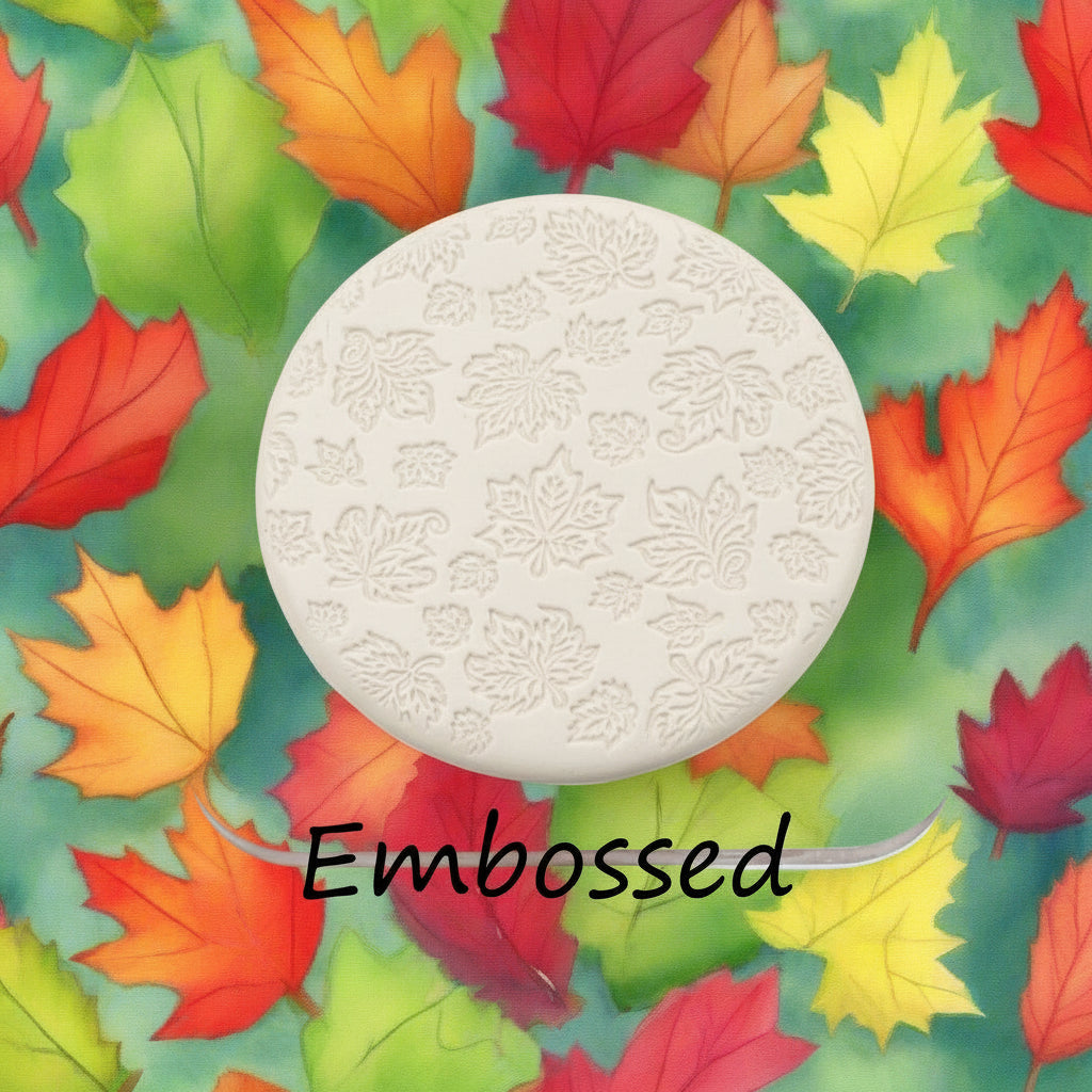 Canadian Leaves debossed in clay Using a  embossed texture mat. This will give you an idea of what it will look like on metal clay or polymer clay