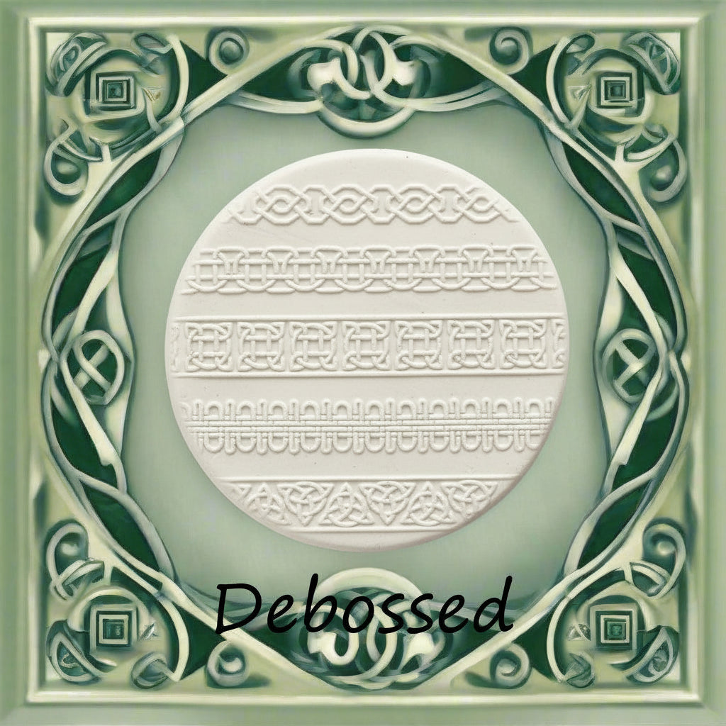 Celtic patterns embossed in  clay using a debossed texture mat. 