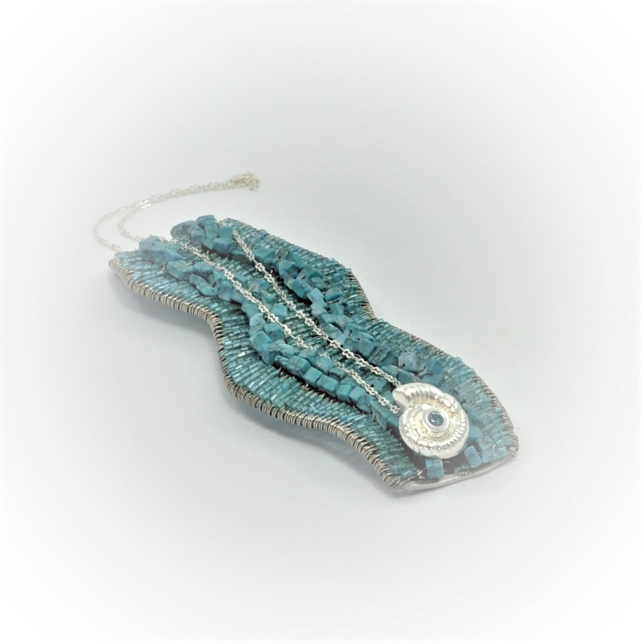 Necklace 999 fine silver fossil pendant with azure cubic zirconia