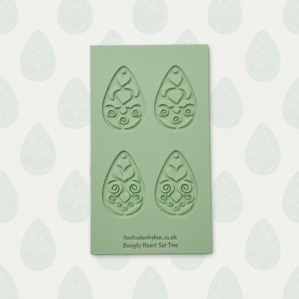 Set of green heart-shaped earrings textures.
