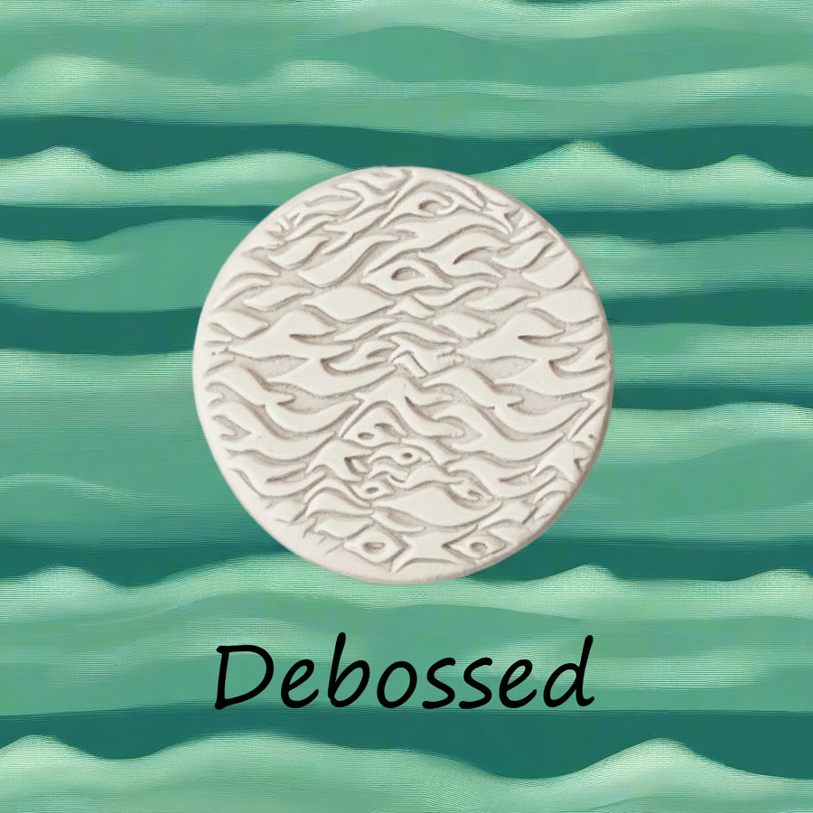 Choppy Sea embossed in clay Using a  debossed texture mat. 