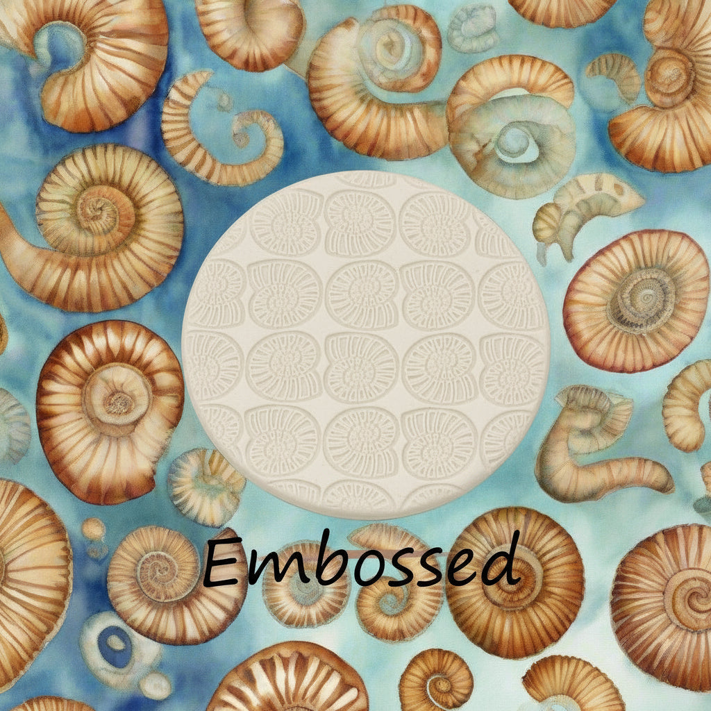 Ammonite debossed in clay using a  embossed texture mat. 