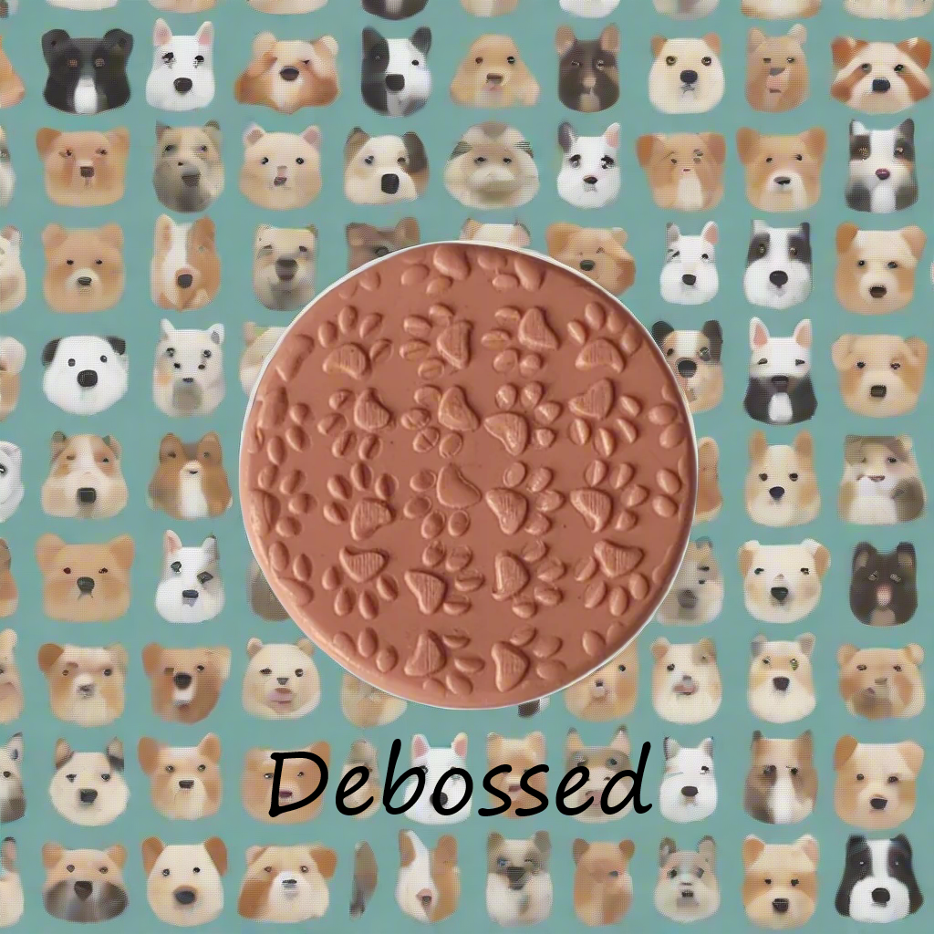 Dog paws embossed in silly putty using a debossed Texture Tile. 