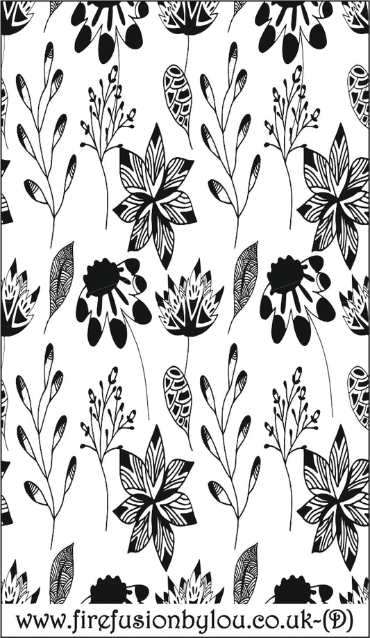 A debossed texture mat of flowers. This picture shows the texture mat pattern in black and white for use on metal clay or polymer clay.