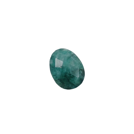 Green gemstone on a white background