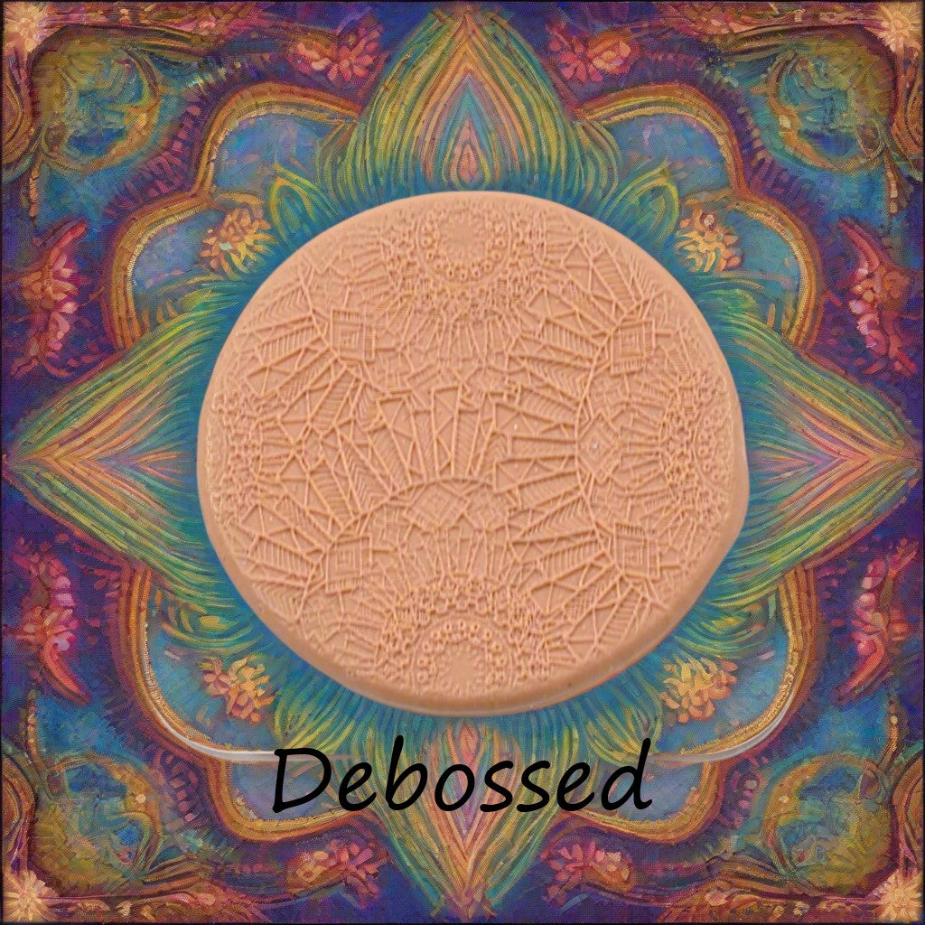 An array of flowery mandala patterned petals embossed in silly putty Using a debossed texture mat in grey material. This will give you an idea of what it will look like on metal clay or polymer clay.