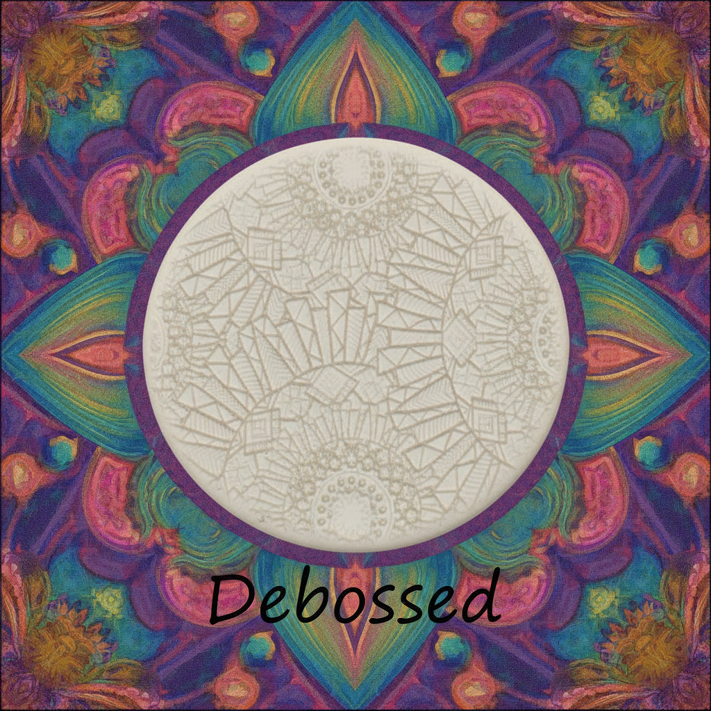An array of flowery mandala patterned petals embossed in clay using a debossed texture mat.