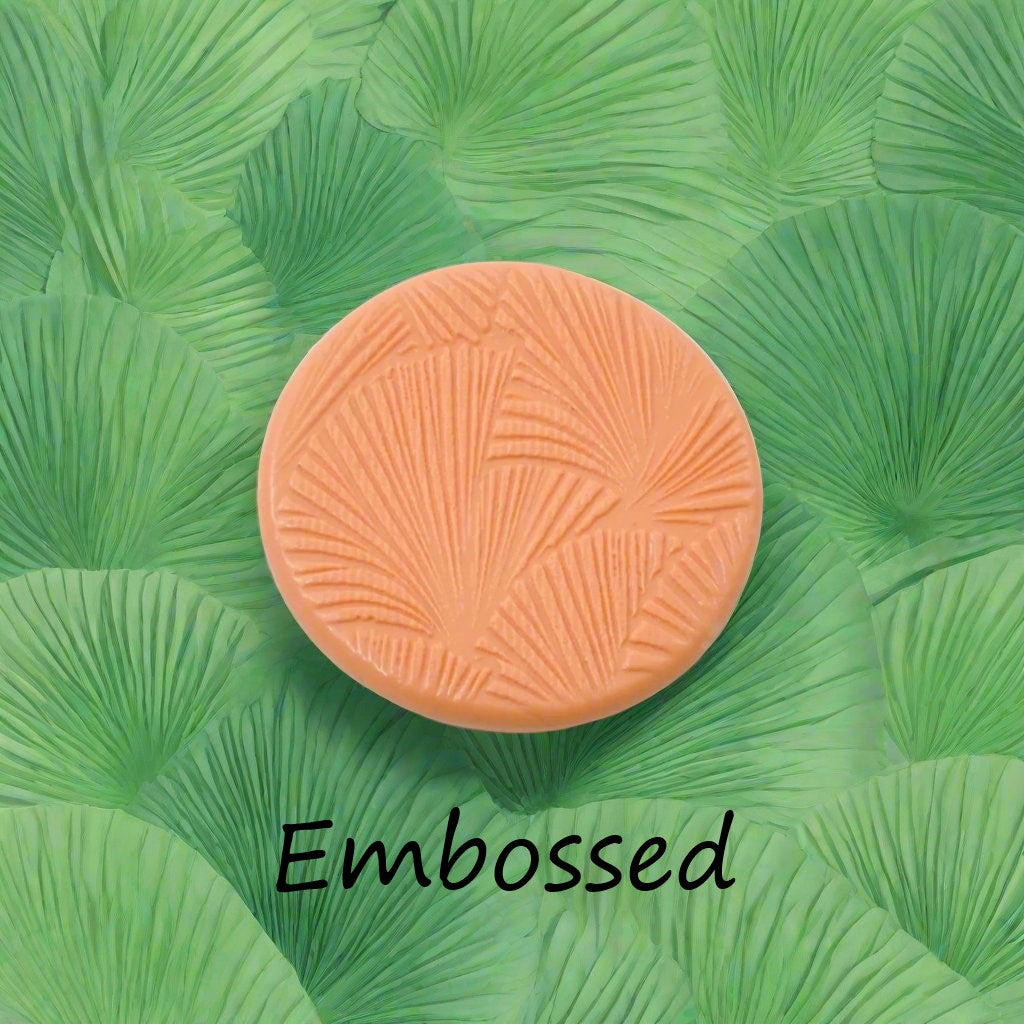 fan leaves debossed in silly putty Using a  embossed texture mat. This will give you an idea of what it will look like on metal clay or polymer clay