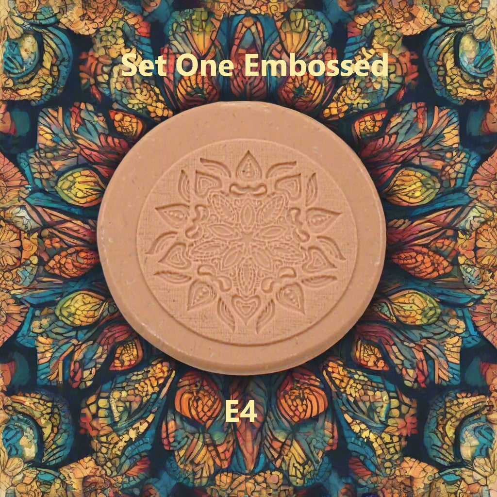 A mandala pattern debossed in silly putty using an embossed texture mat. This will give you an idea of what it will look like on metal clay or polymer clay.