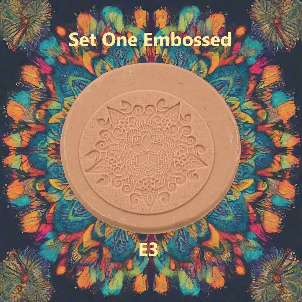 A mandala pattern debossed in silly putty using an embossed texture mat. This will give you an idea of what it will look like on metal clay or polymer clay.