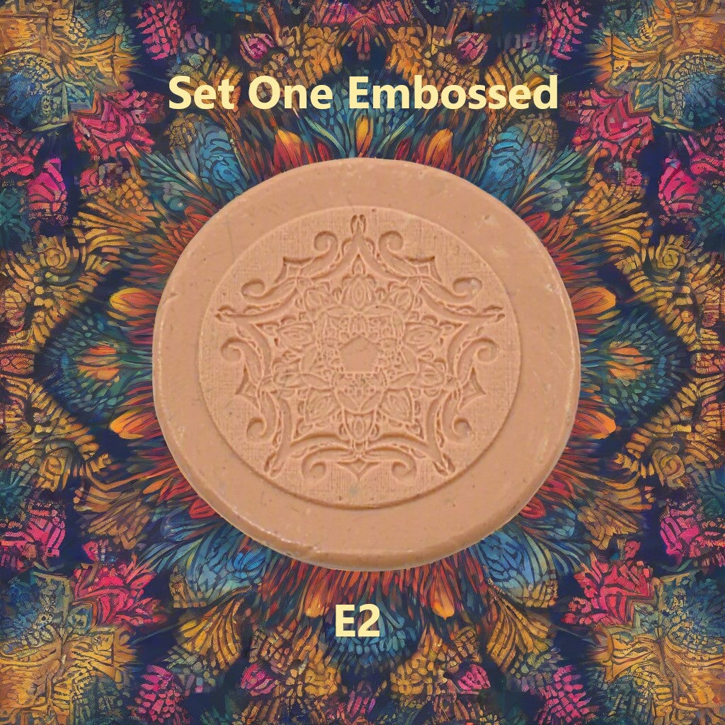 A mandala pattern debossed in silly putty using an embossed texture mat. This will give you an idea of what it will look like on metal clay or polymer clay.