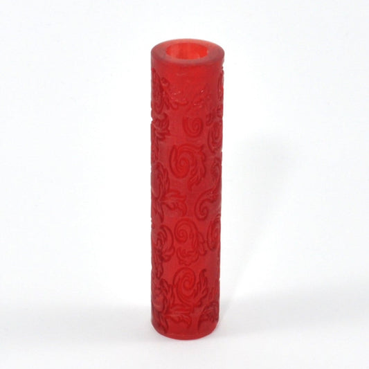 Red textured cylindrical object on a white background
