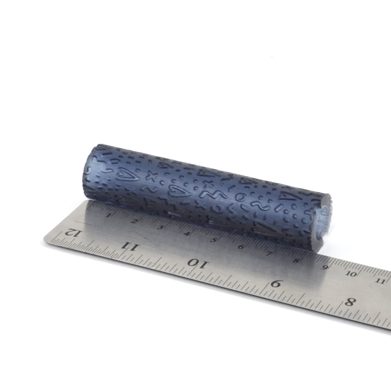 Texture roller with fun hearts embossed In resin.