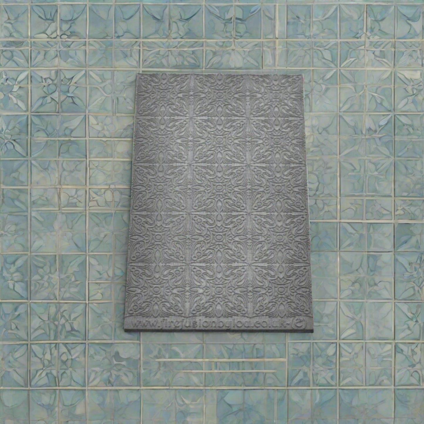 fancy geometric embossed texture mat in grey material. The texture mat pattern will give a debossed effect on metal clay or polymer clay.
