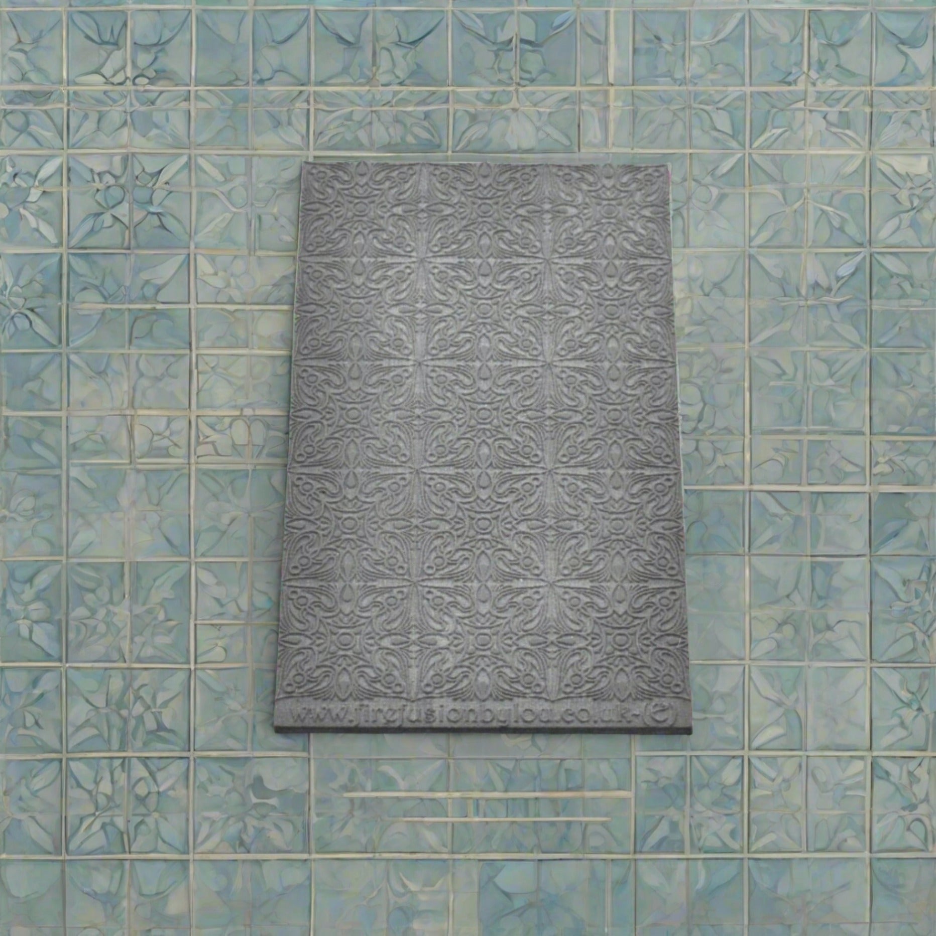 fancy geometric embossed texture mat in grey material. The texture mat pattern will give a debossed effect on metal clay or polymer clay.