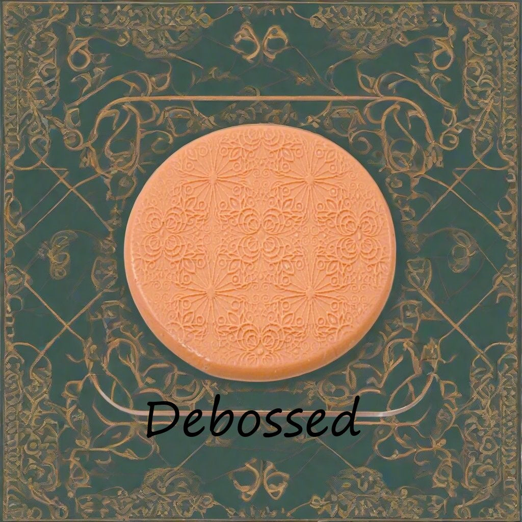 fancy intricate geometric design embossed in silly putty Using a debossed texture mat. This will give you an idea of what it will look like on metal clay or polymer clay