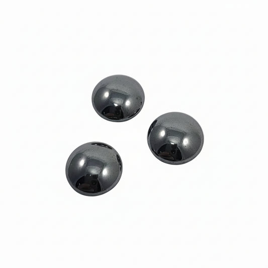 Three metallic gray spheres on a white background