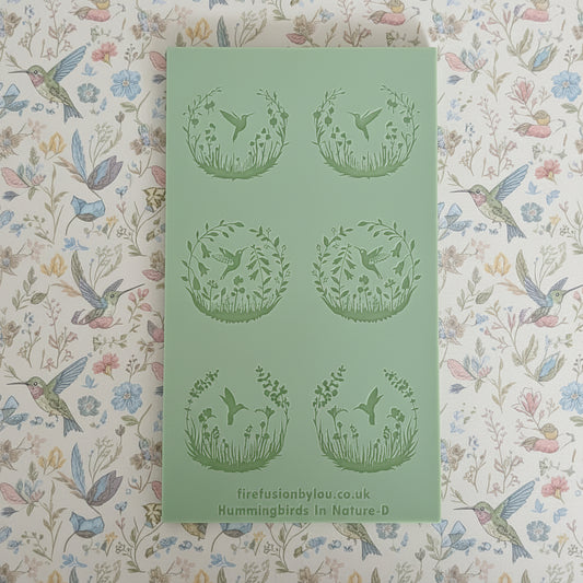 A texture mat with six circular cavities, each featuring an embossed design of a bird in a floral wreath. The brand name firefusionbylou.