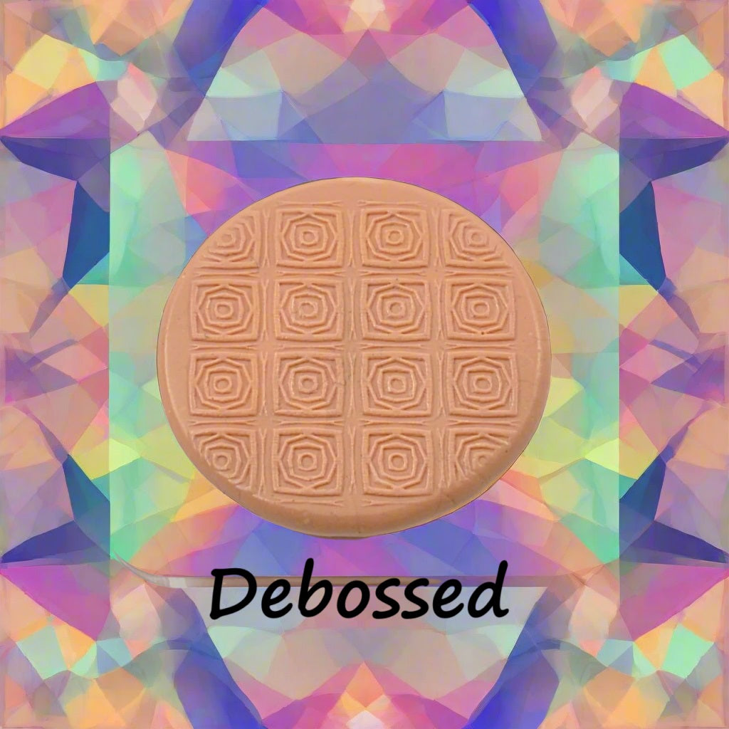 A pattern embossed in silly putty Using a patterned debossed texture mat in grey material. This will give you an idea of what it will look like on metal clay or polymer clay.