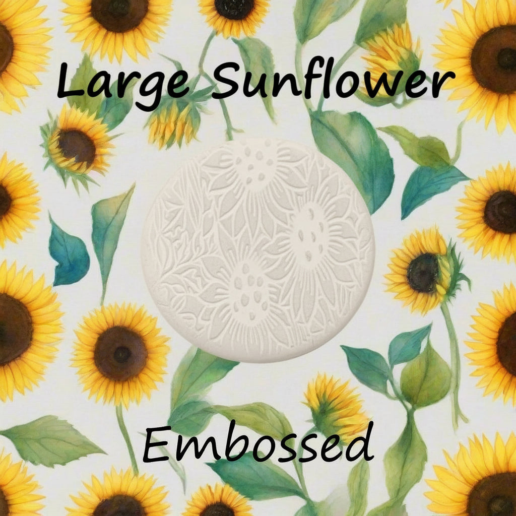 Large sunflower pattern debossed in  clay using a embossed texture mat. 