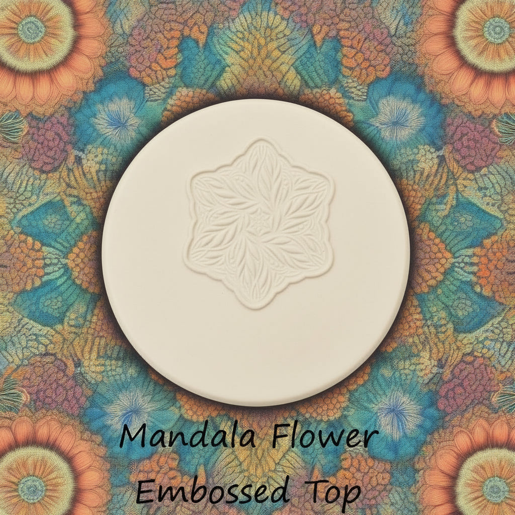 flower mandala debossed in clay using a embossed texture mat. 