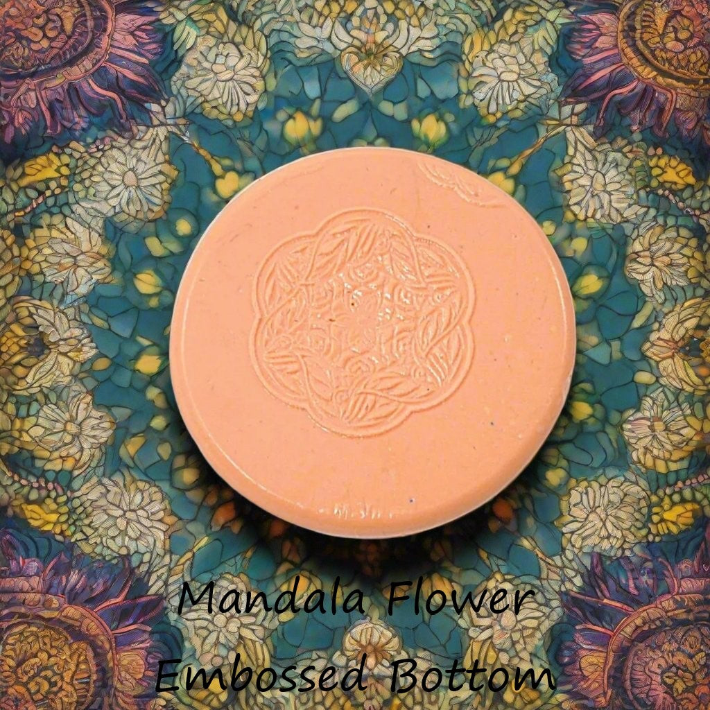 flower mandala debossed in silly putty Using a embossed texture mat. This will give you an idea of what it will look like on metal clay or polymer clay.