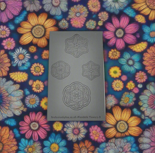 A debossed texture mat with mandala  flowers. Use to make an impression on metal clay and polymer clay.