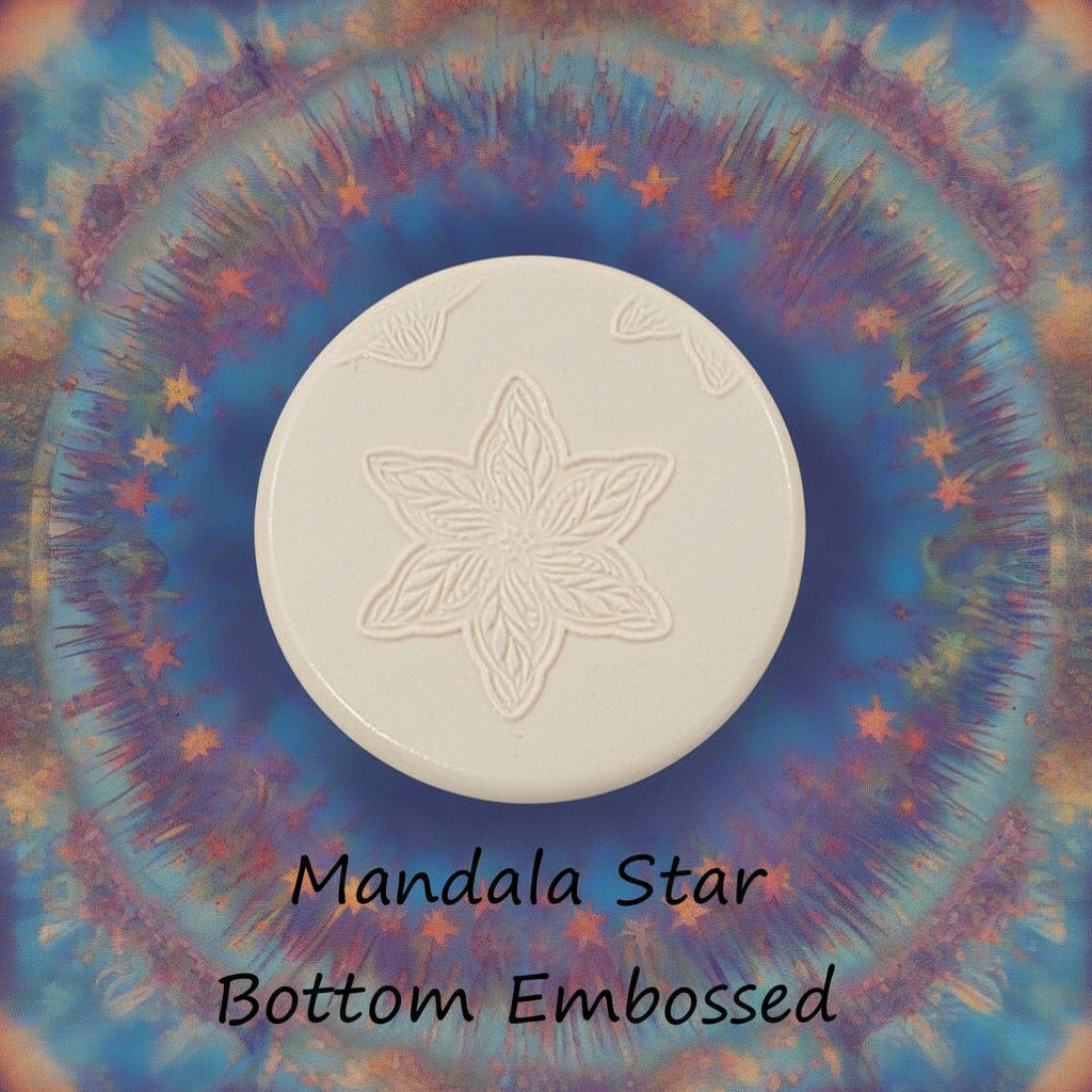 A star flower mandala debossed in clay Using a embossed texture mat. 