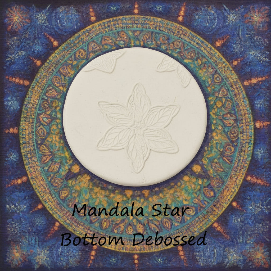 A star flower mandala embossed in clay Using a debossed texture mat. 