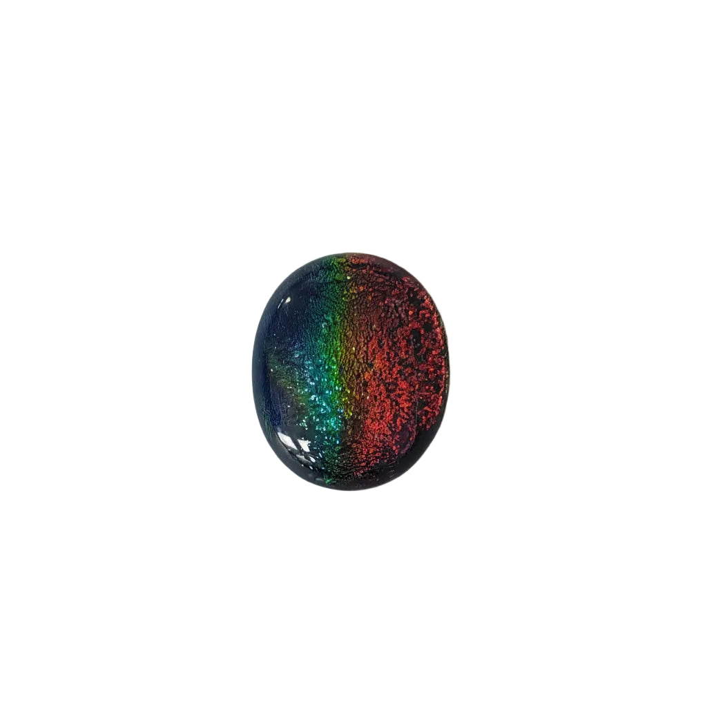 Multi-coloured dichroic glass on a white  background.